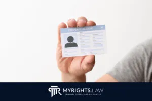 A person holds up a blank driver's license card. The MyRights.Law logo and "Criminal Defense and DUI Lawyer" tagline highlight support for DUI license reinstatement.